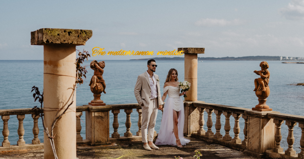 Luxury destination wedding couple in Mallorca with Mediterranean sea view and elegant terrace setting curated by Dybiec Wedding