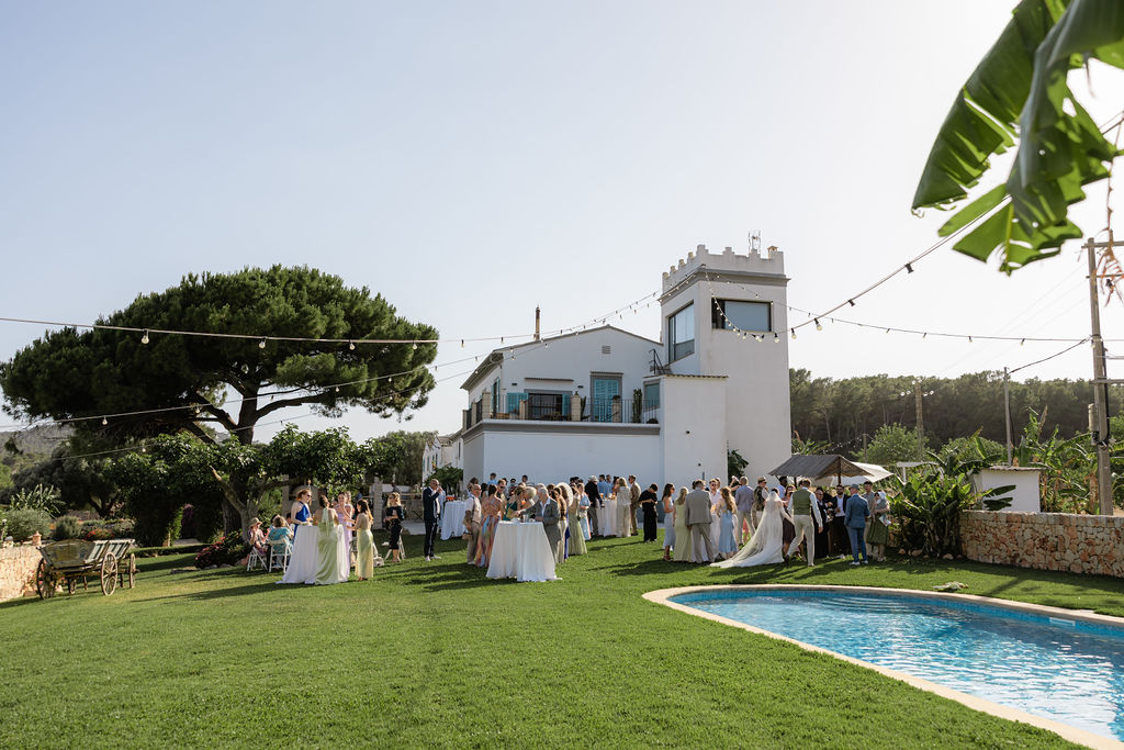 Wedding guests gathered for an outdoor ceremony at a Mallorca finca