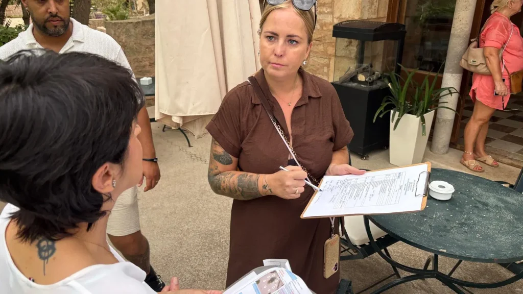 Magdalena Dybiec reviewing a Mallorca wedding venue checklist on site