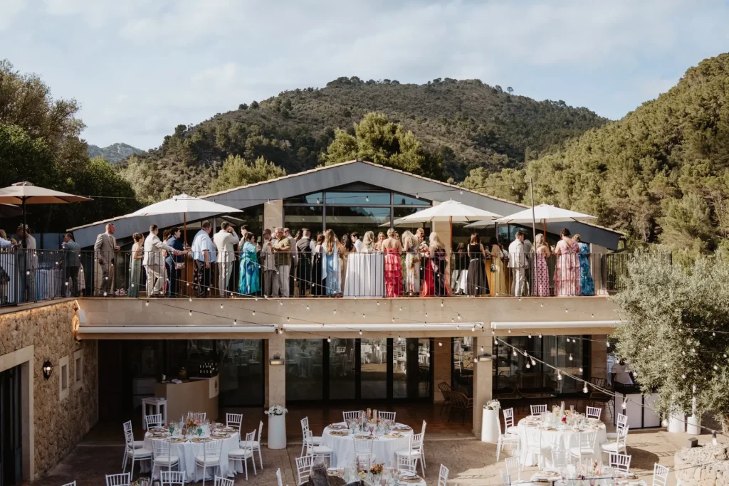 Mountain wedding venue in Mallorca with guests and outdoor reception spaces