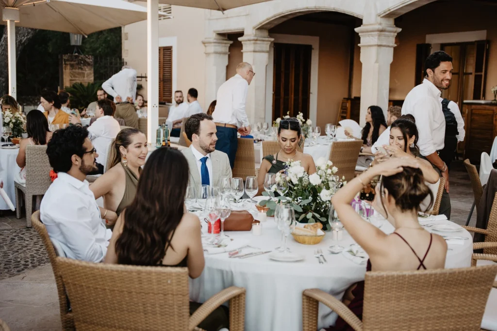 Wedding guests seated together at an outdoor Mallorca reception