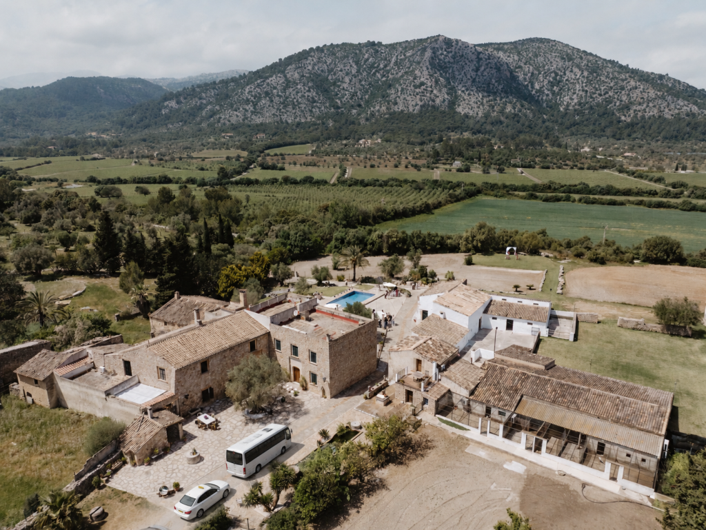 Minibus and taxi arriving at a rural Mallorca wedding finca