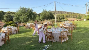 Wedding planner coordinating preparations at an outdoor Mallorca wedding venue